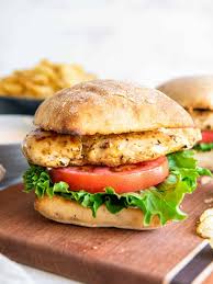 On 
ciabatta, lettuce, tomato, onions